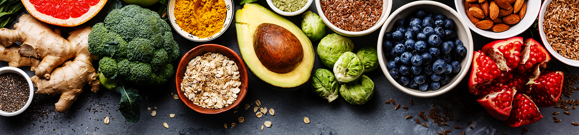 A collection of different foods elegantly arranged in bowls, highlighting a vibrant and diverse selection of dishes.